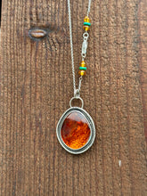 Load image into Gallery viewer, Lithuanian Amber Pendant set in sterling silver on a 16" chain