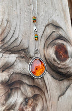 Load image into Gallery viewer, Lithuanian Amber Pendant set in sterling silver on a 16" chain with beaded accents.
